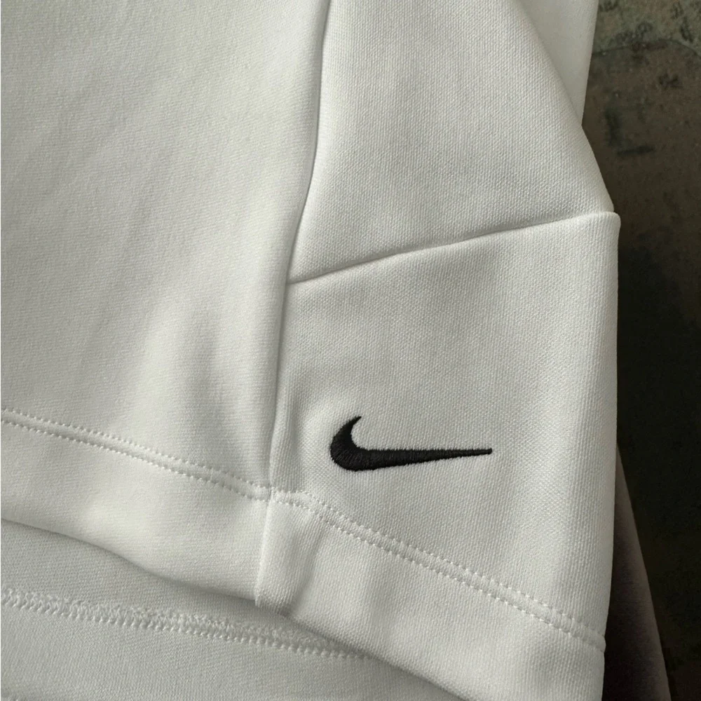 NWT Nike Women’s 1/2 zip, white/black, Large